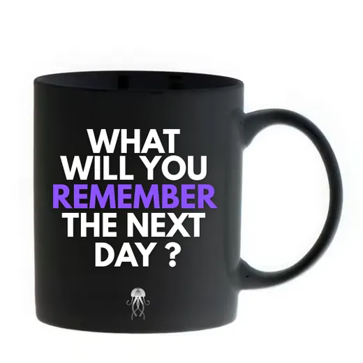 A ceramic mug printed with: What will you remember the next day?